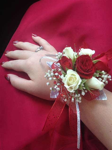 Prom corsage with red & white roses and baby's breath | Corsage prom, Prom flowers corsage, Prom ...