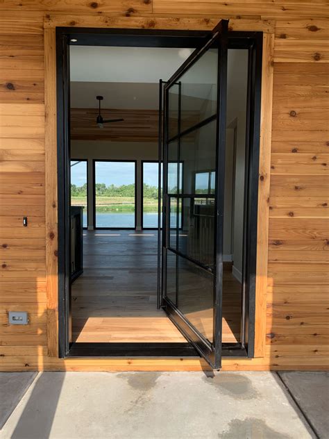 Iron Pivot Glass Doors: Maximize the View and Increase Natural Light in Your Home’s Entryway