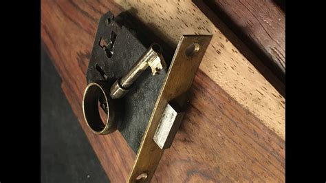fitting key to antique desk lock ~ 4 lever - YouTube
