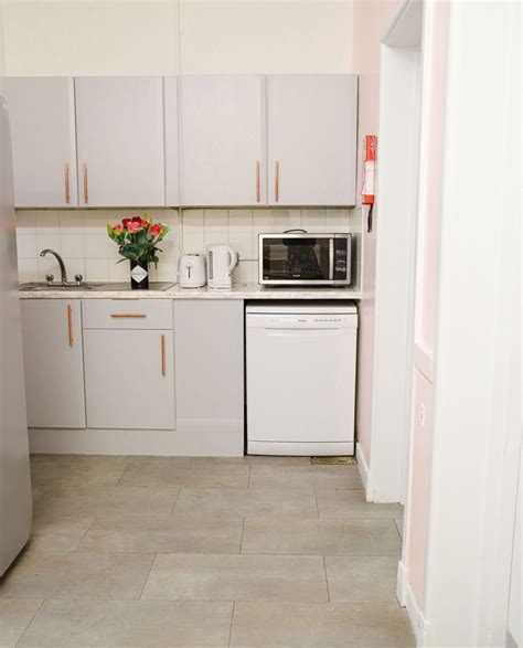 How to paint laminate/MDF kitchen cabinets - Dainty Dress Diaries