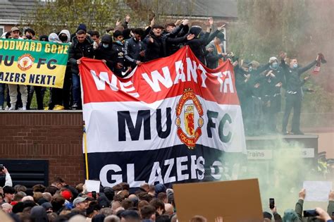 Football: Man Utd fans' anti-Glazer protest forces postponement of ...