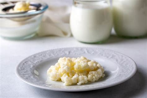 Premium Photo | Kefir fermented milk drink with kefir grains. homemade ...