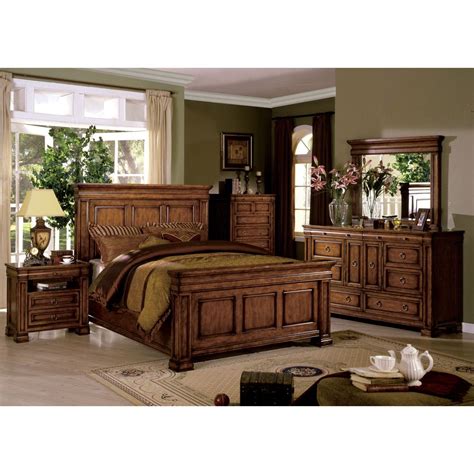 Wood finished in natural Tobacco Oak gives this bedroom set an earthy allure. The platform style ...