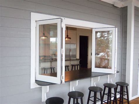 This is a folding window system we did for a client's home at Lake Wateree. When open, the ...