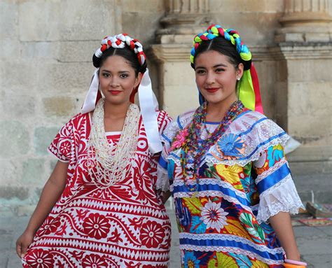 Women of Oaxaca Mexico | Two women wearing beautiful typical huipiles attend guests at a wedding ...