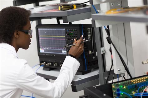 Premium Photo | Scientist african american woman working in laboratory with electronic instruments