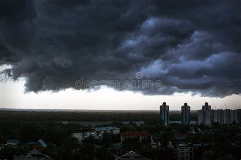 Black Rain Clouds in Sky Above Homes Stock Photo - Image of evening ...