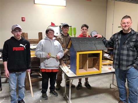 Lake Region school students build little free libraries