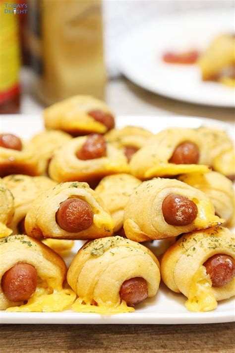 Crescent Roll Pigs in a Blanket with Garlic Herb Butter are Lil’ Smokies or mini hot dogs and ...