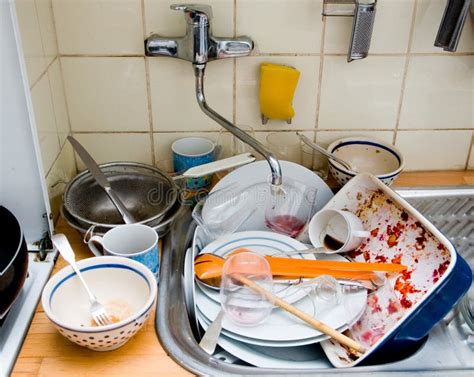 Messy kitchen sink stock image. Image of dishware, high - 36147863