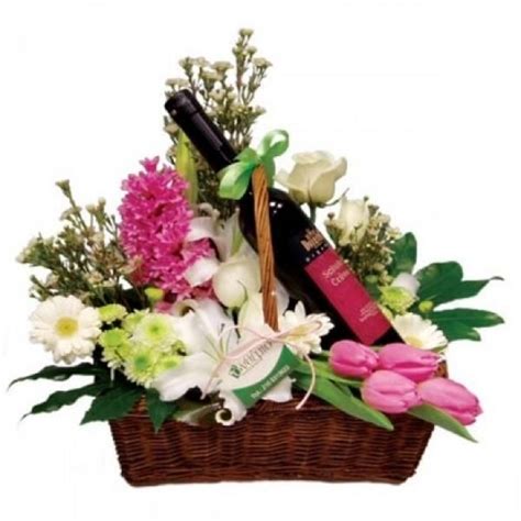 GIFT BASKET, WITH FLOWERS AND A BOTTLE OF WINE. | Anniversary flowers, Birthday flower delivery ...