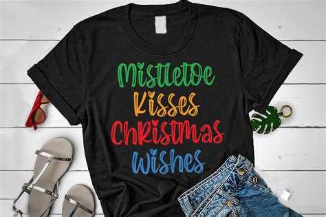 Mistletoe Kisses Christmas Wishes Graphic by Tshirt4Pod · Creative Fabrica