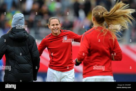 USA's Christie Rampone (C) smiles before the women's international ...