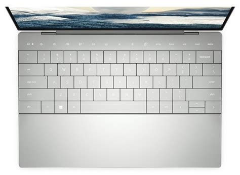 Dell's XPS 13 Plus adds Touch Bar-style capacitive keys and haptic trackpad, drops the headphone ...