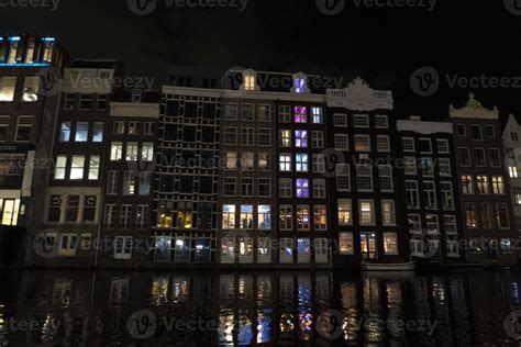 amsterdam canals cruise at night 20225769 Stock Photo at Vecteezy