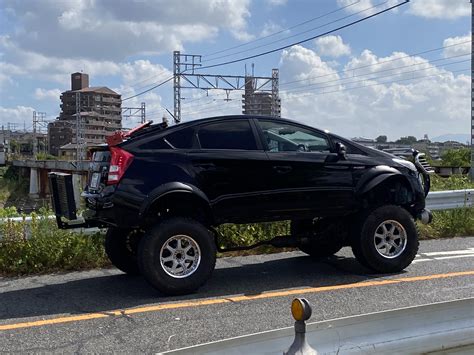 Just a [Toyota Prius] monster truck out for a drive this morning : r/spotted