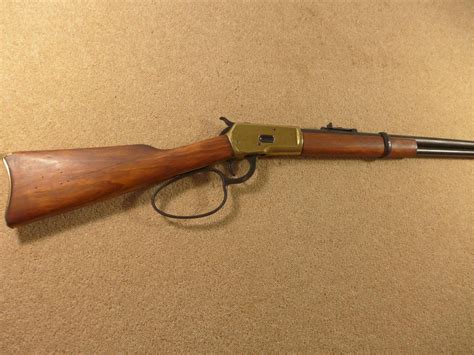 A DENIX REPLICA NON FIRING 'JOHN WAYNE' WINCHESTER RIFLE, WITH ORIGINAL BOX