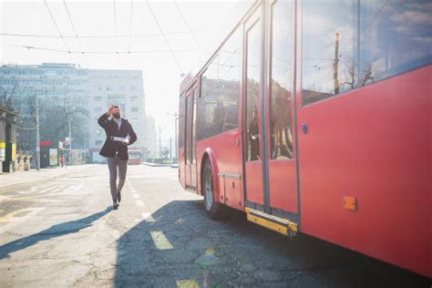 Running To Catch Bus Stock Photos, Pictures & Royalty-Free Images - iStock