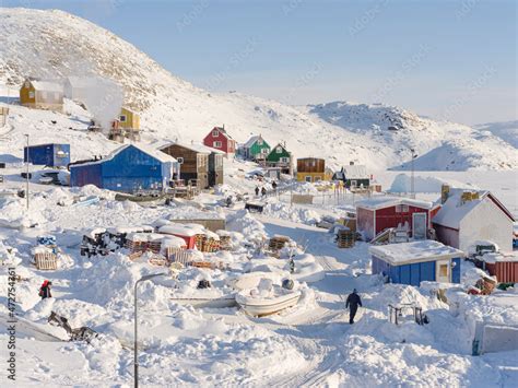 The traditional and remote Greenlandic Inuit village Kullorsuaq located ...