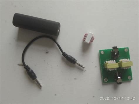 Encased ground loop isolator (left), audio transformer (centre) and... | Download Scientific Diagram