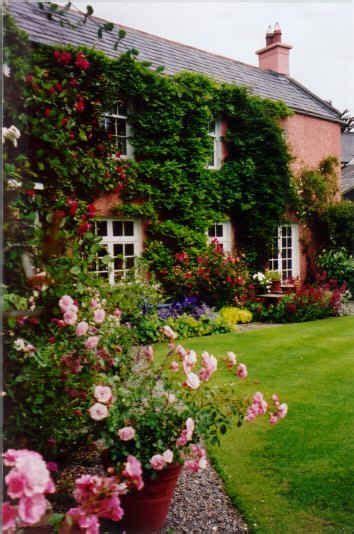 English cottage with rose garden … | English cottage garden, English cottage, Cottage garden