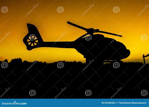 Silhouette of Helicopter on Sunset Stock Photo - Image of army, conflict: 65340362