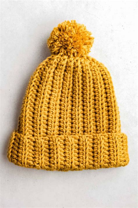 Learn how to make an easy crochet beanie hat with stretchy knit-look half-double crochet ribbing ...