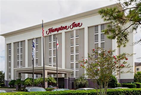 Hampton Inn Orlando-International Airport, Orlando, FL : hotel during the day - Dayuse.co.uk