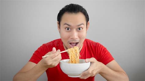 Man eat noodles. stock image. Image of cuisine, girl - 71109657