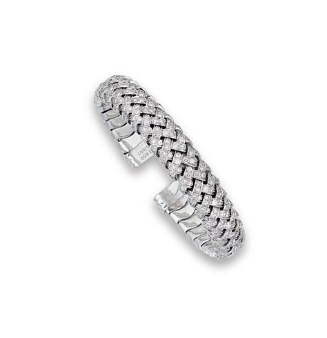 A DIAMOND BANGLE, BY TIFFANY & CO. | Christie's