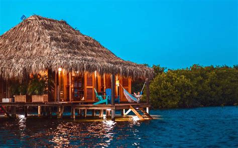 This Hidden Resort in Aruba Has the Island's Only Overwater Villas | Travel + Leisure