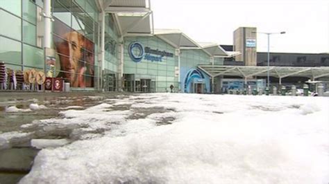 Birmingham Airport re-opens after snowfall - BBC News