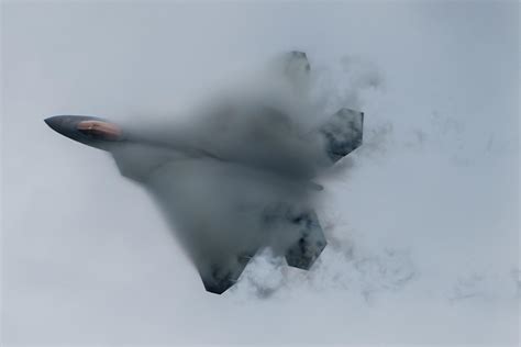 Maj. Paul Lopez, F-22 Raptor Demo Team commander, performs a stiff-pitch maneuver during an ...