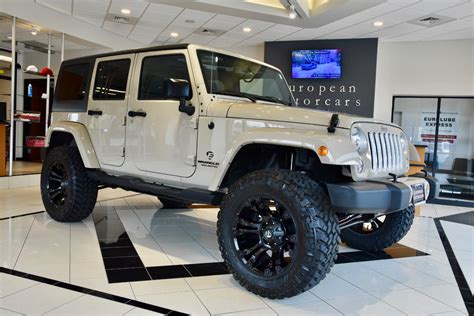 Lifted Jeep Wrangler 4 Door Tan