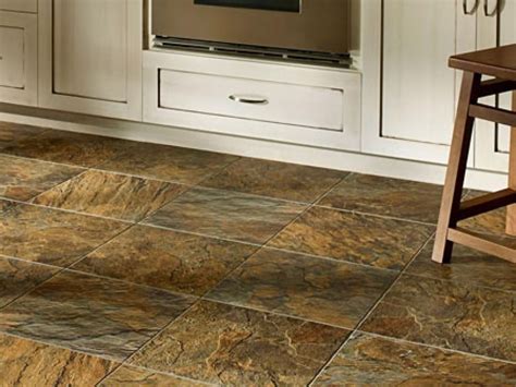 Inspired by nature, this luxury vinyl tile closely mimics slate, complete with rich colors and ...