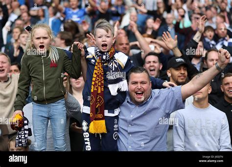 MIllwall fans celebrate in the stands after their side win the Sky Bet ...