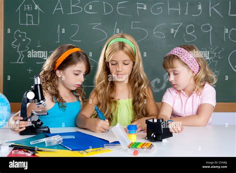 kids group of student girls at school classroom as children teamwork ...