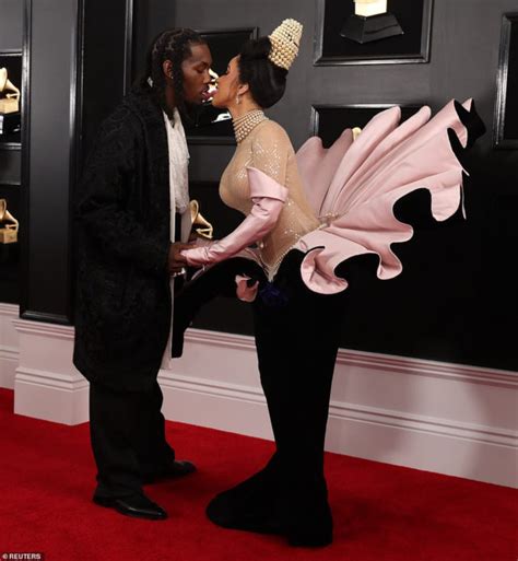 Cardi B and Offset shares tongue-to-tongue kiss on the Grammys red carpet