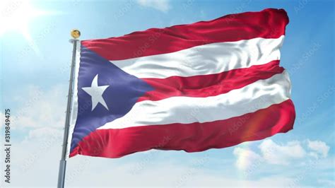 Puerto Rico flag waving in the wind against deep blue sky. National ...