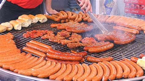 Poland Street Food, Kielbasa Sausages and more Meat Roasted on Grill ...