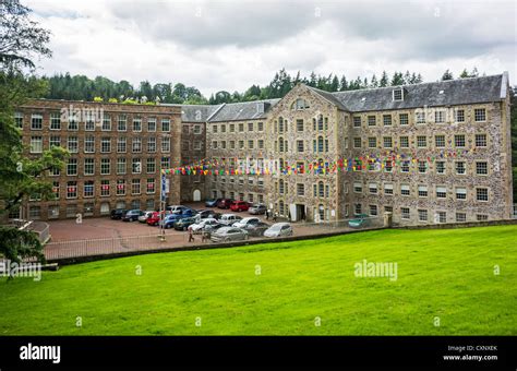 View of New Lanark Heritage Site with New Lanark Mill Hotel (right ...