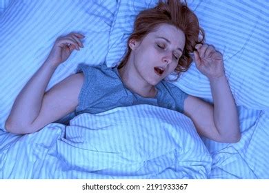 Woman Sleeping On Her Back Snoring Stock Photo 2191933367 | Shutterstock