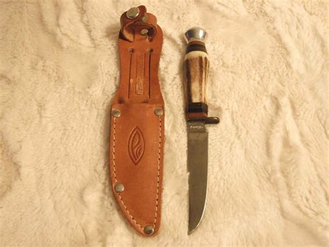 Hunting& Jack Knives (5)(Premier, Germany, Gerber USA)