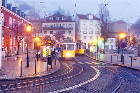 Premium Photo | Yellow 28 tram in alfama, lisbon, portugal