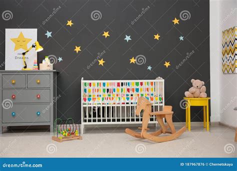 Cute Baby Room with Modern Crib and Rocking Horse Stock Photo - Image ...