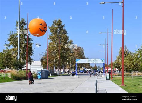 IRVINE, CALIFORNIA - 08 OCT 2022: Entrance banner for the Irvine Global Village Festival with ...