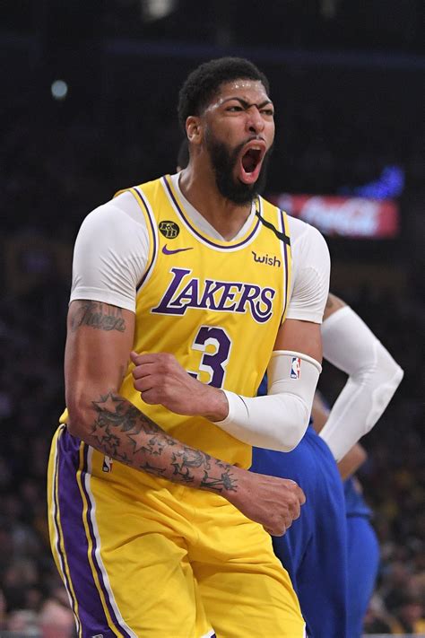 Anthony Davis scores 37, leads Lakers past Sixers 120-107 | AP News