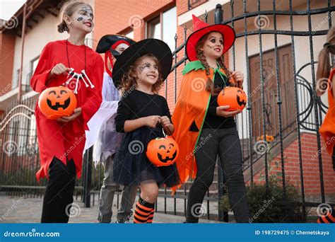 Cute Little Kids Wearing Halloween Costumes Going Trick-or-treating ...