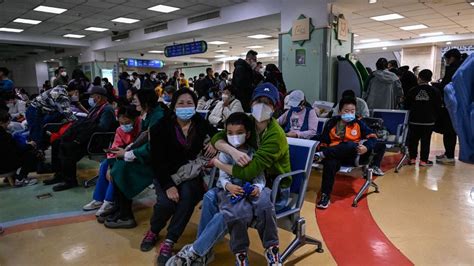 Northern China hospitals overwhelmed with surge in respiratory ...