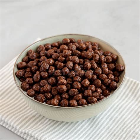 Chocolate Puff Cereal with Milk in a Bowl, Side View Stock Image ...